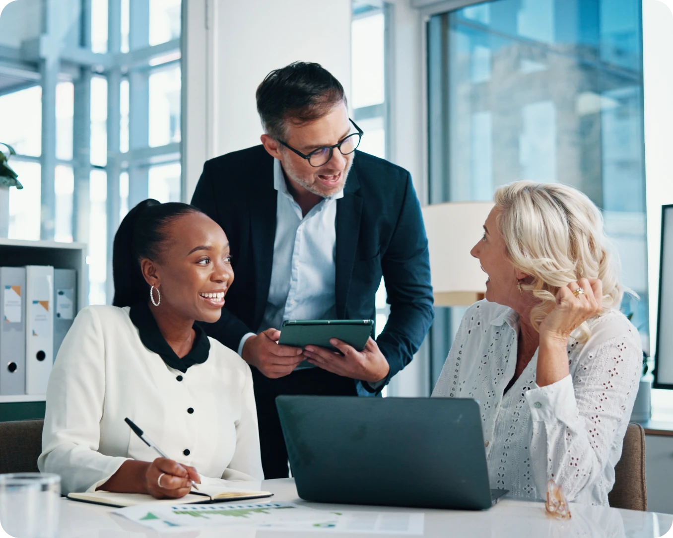 Professionals collaborating in a bright office